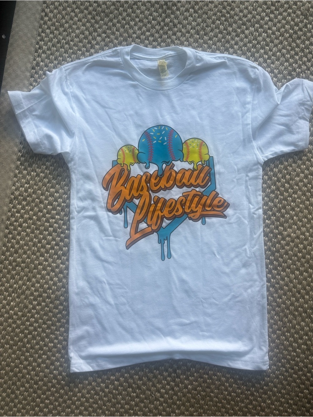 Next Level Apparel White T-Shirt with Colorful Baseball Lifestyle Graphic